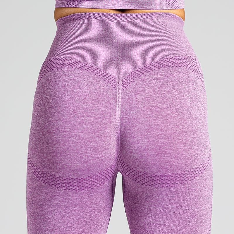 Seamless Yoga Leggings in Lila; blickdichte nahtlose High-Waist-Leggings mit Mesh-Details für Yoga, Pilates und low-impact Training.
