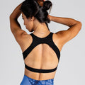 Comfort Padded Yoga Bra in Schwarz; gepolsterter Sport-BH mit Wrap-Optik und tiefem Rückenausschnitt für Yoga, Pilates und low-impact Training.