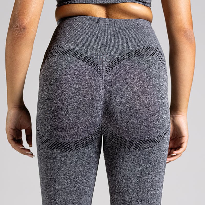 Seamless Yoga Leggings in Dunkelgrau; blickdichte nahtlose High-Waist-Leggings mit Mesh-Details für Yoga, Pilates und low-impact Training.
