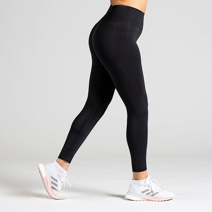 Soft Flow Yoga Leggings in Schwarz; nahtlose High Waist Sport-Leggings mit Mesh-Details für Yoga, Pilates und low-impact Training.