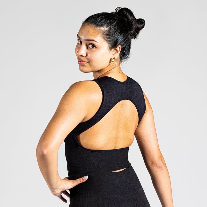 Open Back Workout Bra in Schwarz; nahtloser Sport BH mit offenem Rücken für Damen, ideal für Yoga, Pilates und low-impact Training
